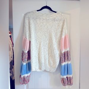 Sweater with detailed sleeves